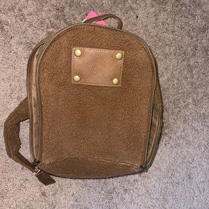 Sherpa mini backpack; brand new still in packaging with tags; cognac brown